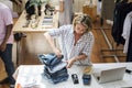 Woman folding jeans concept