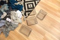 Spring cleaning of closet. Vertical tidying up storage. Neatly folded clothes in the metal black baskets for wardrobe. Wooden