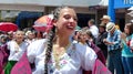 Woman folk dancer in dress of Azuay province, Ecuador