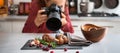 Woman food photographer taking closeup of mushrooms Royalty Free Stock Photo