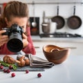 Woman food photographer taking closeup of mushrooms Royalty Free Stock Photo