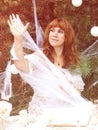 Woman in the forest. fantasy image. Sorceress, spider web of thread