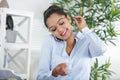 Woman in formal ware on phone