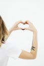 Woman forming a heart with her hands