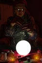 Woman fortune teller doing sorcery