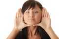 Woman, framing her face with her hands Royalty Free Stock Photo