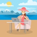 Woman freelancer on the beach.