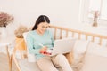 Woman freelancer female hands with pen writing on notebook at home or office Royalty Free Stock Photo