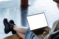 woman freelancer using laptop working online on railway station. Business trip concept Royalty Free Stock Photo