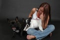 Woman with French bull dogs