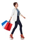 Woman with French flag colours shopping bags going to side Royalty Free Stock Photo