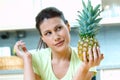 Woman with fresh pineapple Royalty Free Stock Photo