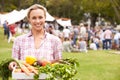 Woman With Fresh Produce Bought At Outdoor Farmers Market Royalty Free Stock Photo