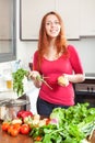 Woman with fresh vegetables Royalty Free Stock Photo