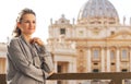 Woman in front of basilica di san pietro Royalty Free Stock Photo