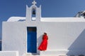 Woman in front of church in Santorini Royalty Free Stock Photo