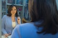 Woman in front of a mirror in the dressing room Royalty Free Stock Photo