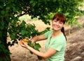 Woman in fruit garden