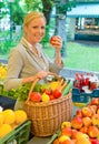 Woman at the fruit market Royalty Free Stock Photo