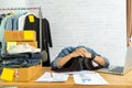 Woman frustrated exhausted laid her head down on the table Royalty Free Stock Photo