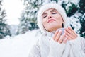 Woman in fur white hat enjoy with warm drink Royalty Free Stock Photo