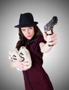 Woman gangster with handgun on the white Royalty Free Stock Photo