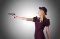 Woman gangster with handgun on white Royalty Free Stock Photo