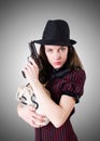 Woman gangster with handgun on white Royalty Free Stock Photo