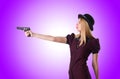 Woman gangster with handgun on white Royalty Free Stock Photo