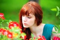 Woman in garden of roses Royalty Free Stock Photo