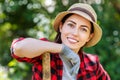 Woman gardener holding shovel Royalty Free Stock Photo