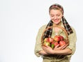 Woman gardener rustic style hold basket with apples on white background. Lady farmer gardener know how cook many recipes