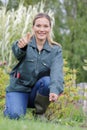 woman gardener smiling with thumb up Royalty Free Stock Photo