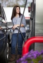 Woman at gas station Royalty Free Stock Photo