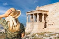 Woman Gazes at The Erechtheion or Temple of Athena Polias, Acropolis, Athens, Greece Royalty Free Stock Photo