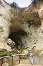 A Woman Gazes Up from the Tonto Natural Bridge Observation Deck Royalty Free Stock Photo