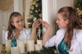 Woman Gazing at Self in Mirror