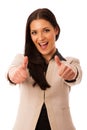 Woman gesturing success with thumbs up and big happy smile. Royalty Free Stock Photo