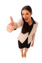 Woman gesturing success with thumbs up and big happy smile. Royalty Free Stock Photo