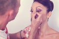Woman geting make-up on