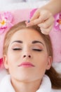 Woman Getting Acupuncture Treatment