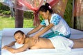 Woman getting a back massage.