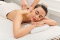 Woman getting classical back and neck massage Royalty Free Stock Photo