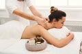 Woman getting classical back and neck massage Royalty Free Stock Photo