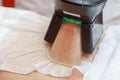 Woman getting cryolipolysis fat treatment in professional cosmetic cabinet Royalty Free Stock Photo