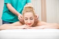 Woman getting ear massage Royalty Free Stock Photo