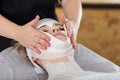 Woman getting enzymatic peeling at beautician`s Royalty Free Stock Photo