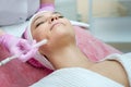 Woman getting face peeling procedure in a beauty SPA salon Royalty Free Stock Photo