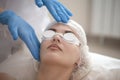 Antiaging Procedures Concept. Caucasian Woman Getting Facial Beauty Treatment While Removing Pigmentation in Clinic Using Intense Royalty Free Stock Photo