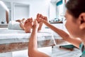 Woman getting feet massage in the spa salon